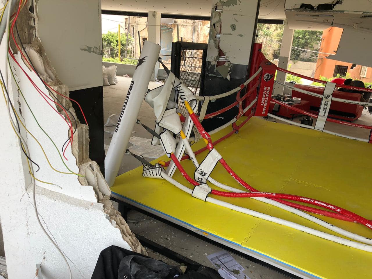 The Praetorians boxing ring destroyed after the blast, ropes and pads torn